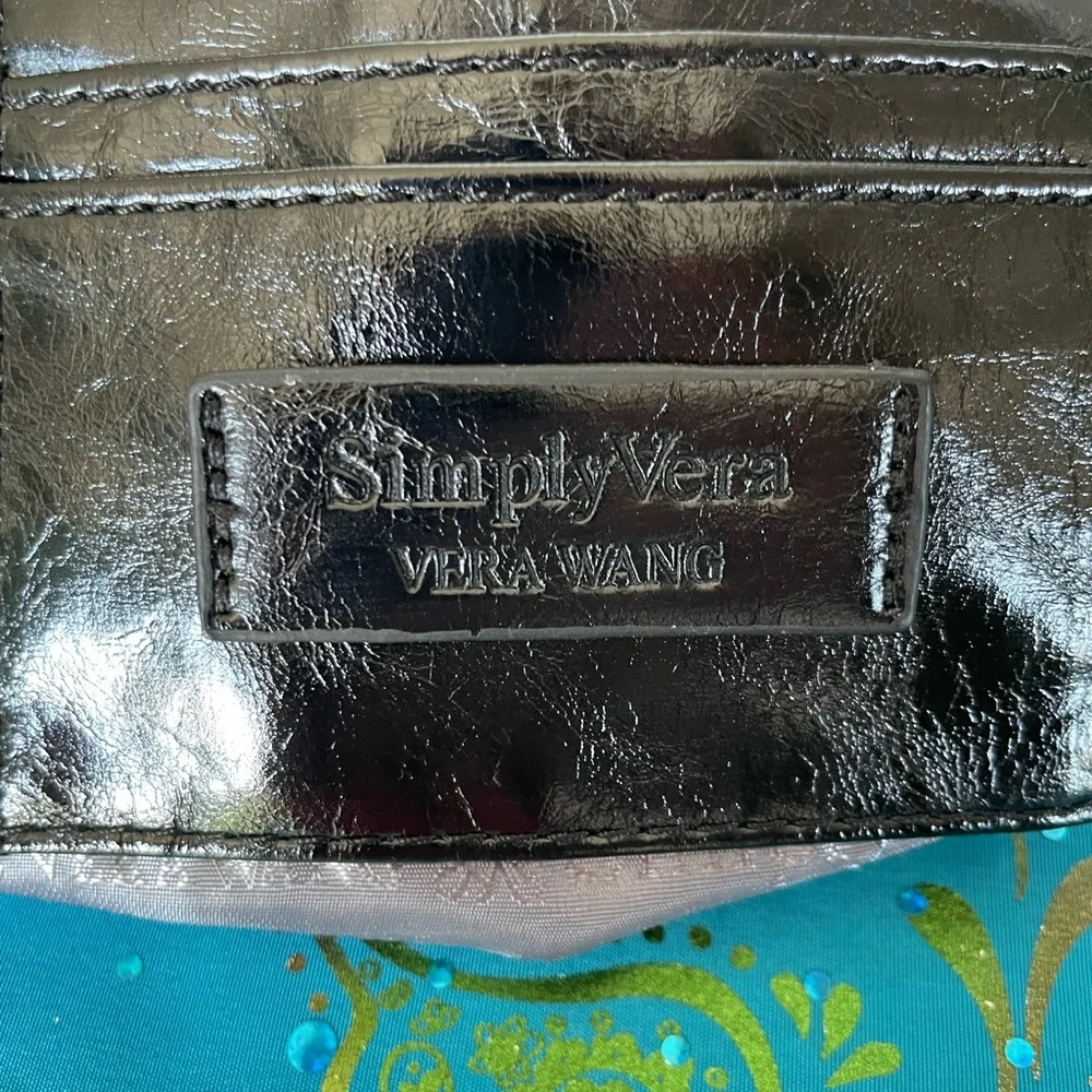 NWOT Simply Vera Vera Wang Perforated Wristlet